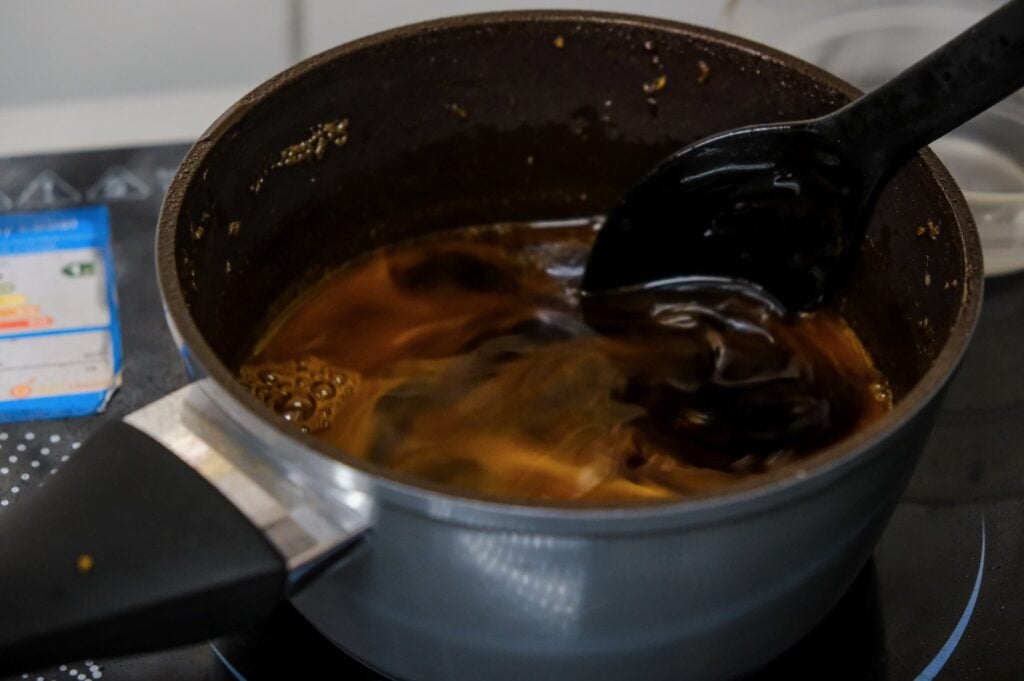 easy homemade teriyaki sauce being stirred in a pot