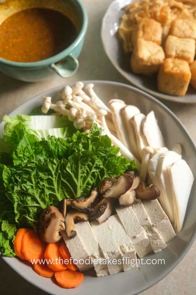 fresh tofu, mushrooms, greens for Chinese hot pot