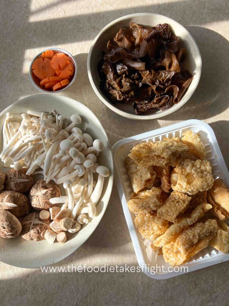 Carrots, fresh mushrooms, black ear mushroom, fried beancurd rolls