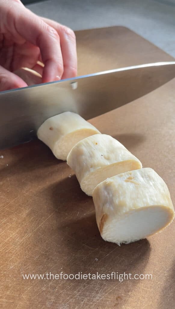 Slicing king oyster mushrooms