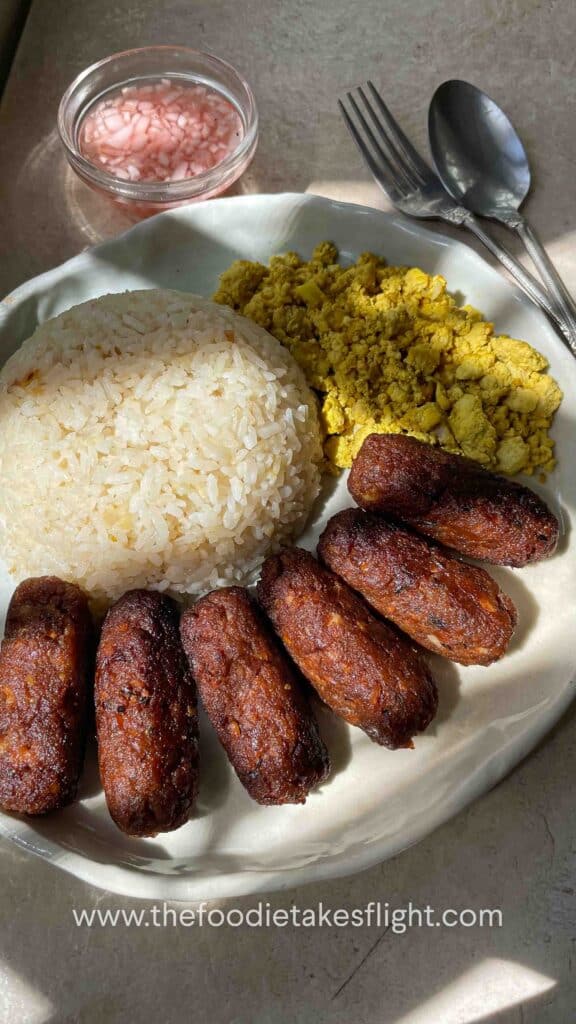 vegan filipino longganisa or filipino sausages with garlic rice and tofu scramble