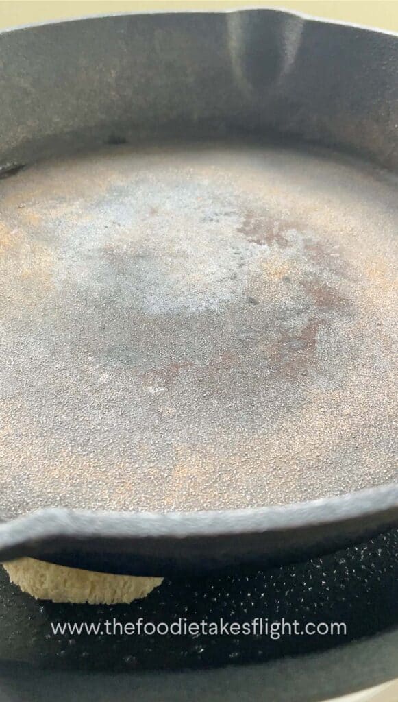 cast iron skillet over the mushrooms