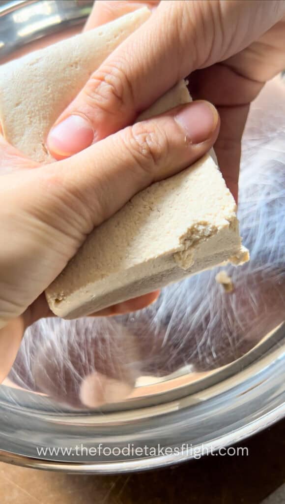 mashing extra firm tofu