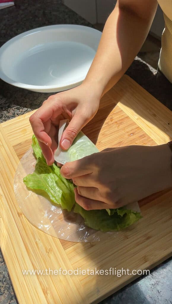 folding rice paper rolls with tofu and mushroom filling