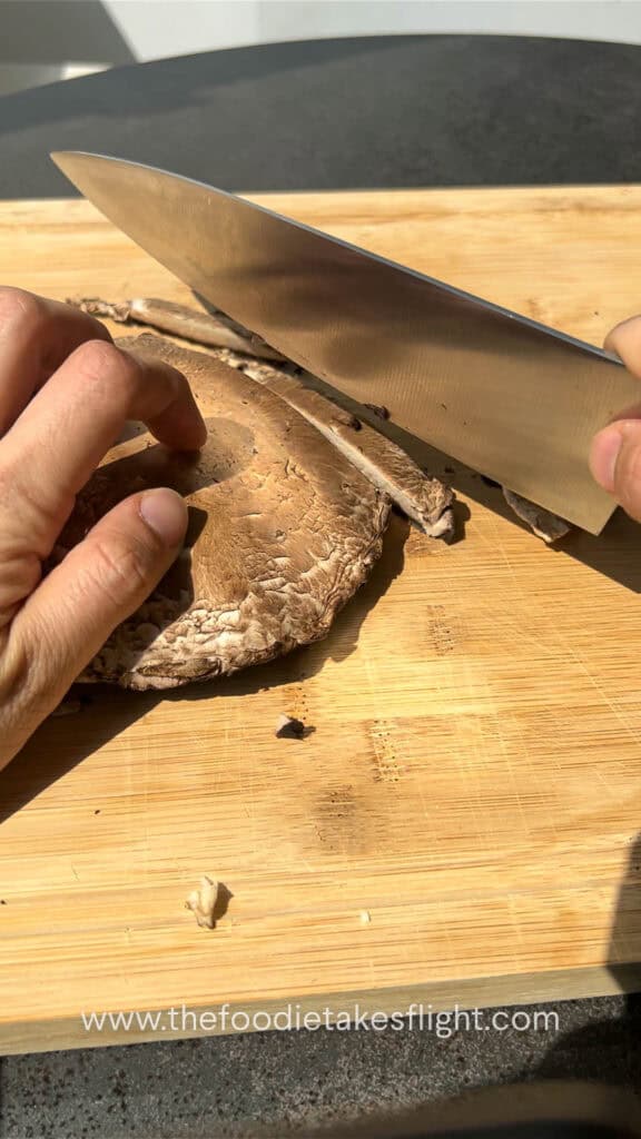 slicing portobello mushrooms
