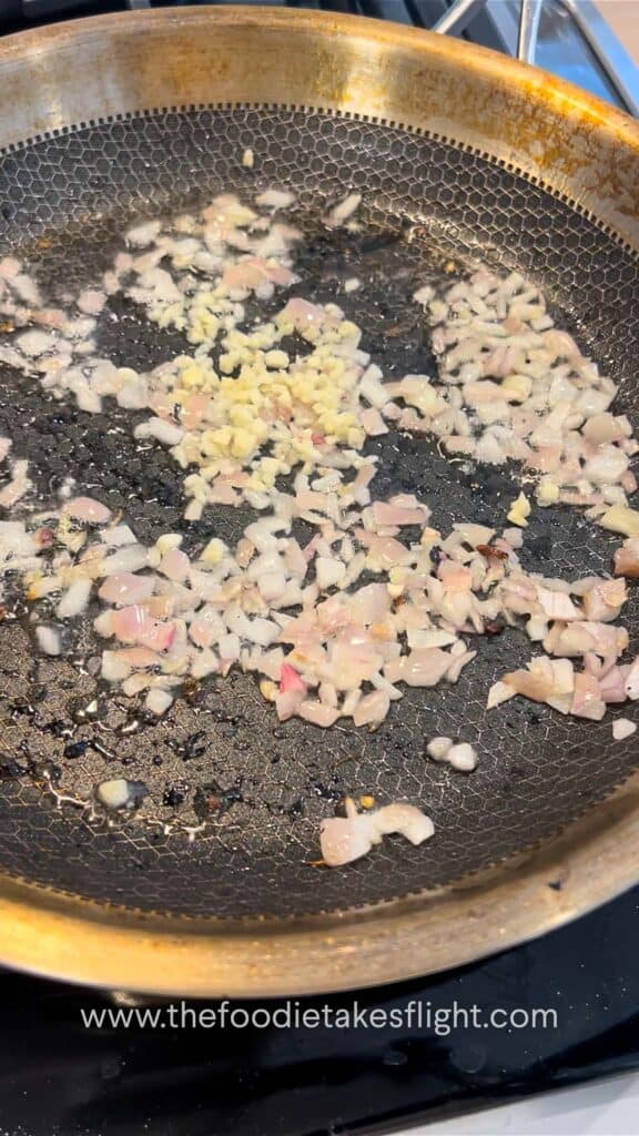 cooking diced shallots and garlic