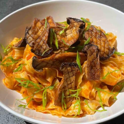 shallot gochujang noodles with pan seared king oyster mushrooms