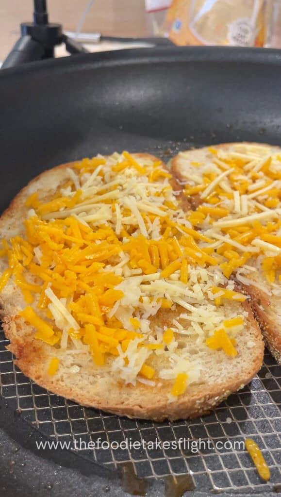 Adding cheese on bread