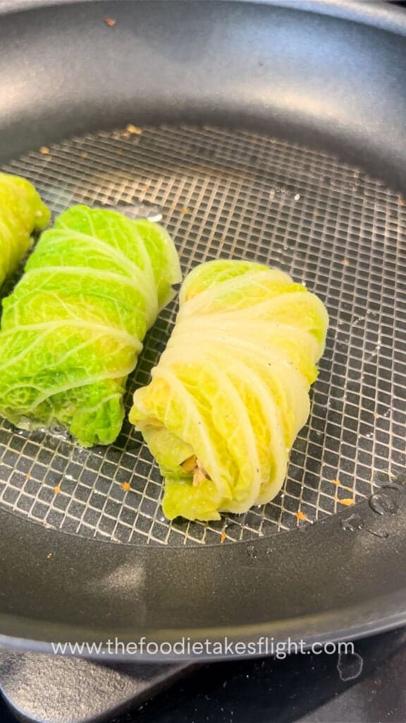 pan frying the cabbage rolls