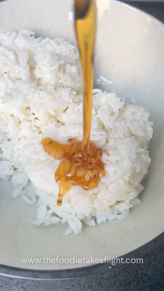 adding sesame oil to rice