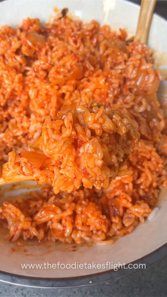 mixing kimchi rice