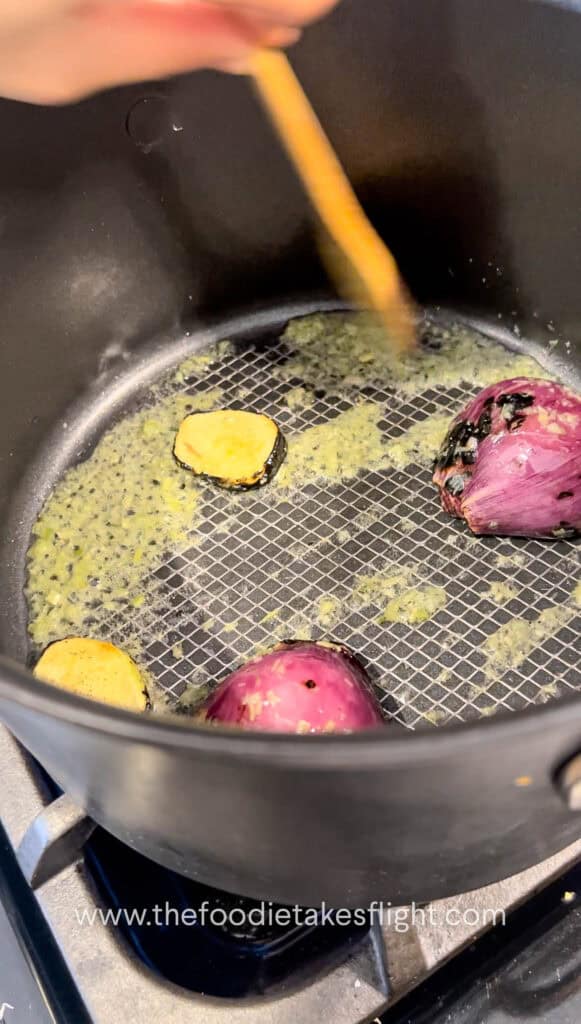 stir frying lemongrass with onion and ginger