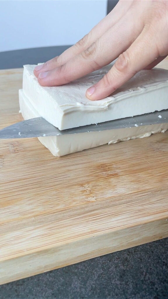 slicing soft tofu for mapo tofu