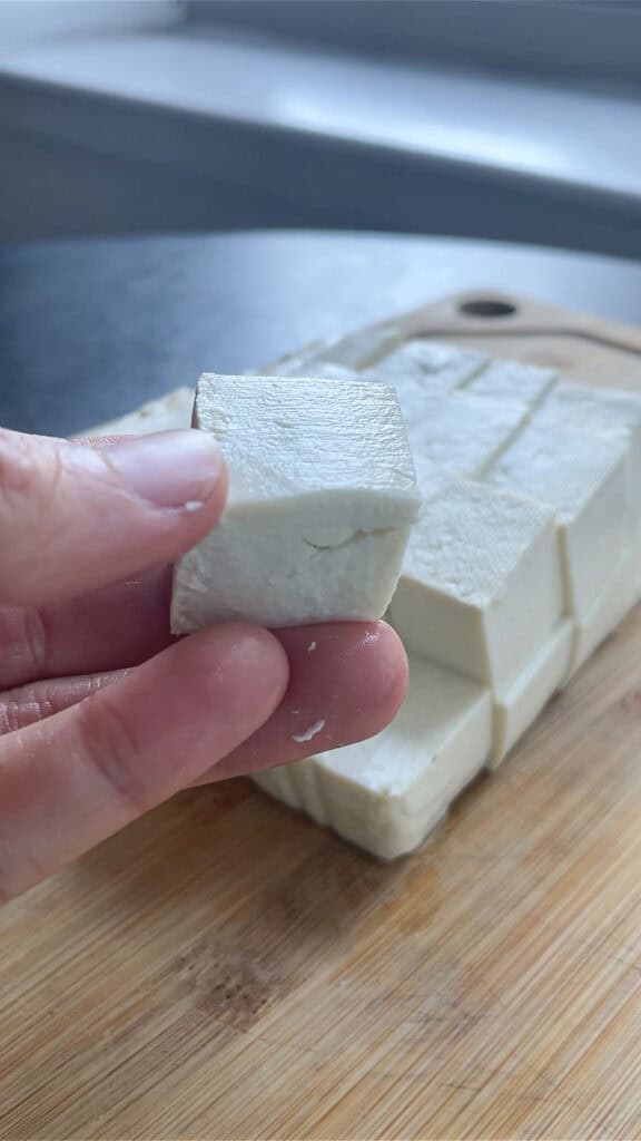 slicing soft tofu for mapo tofu
