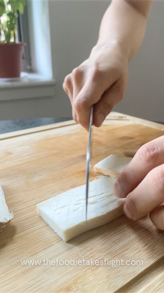 slicing king oyster mushroom