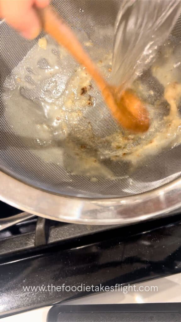 making roasted garlic and miso broth