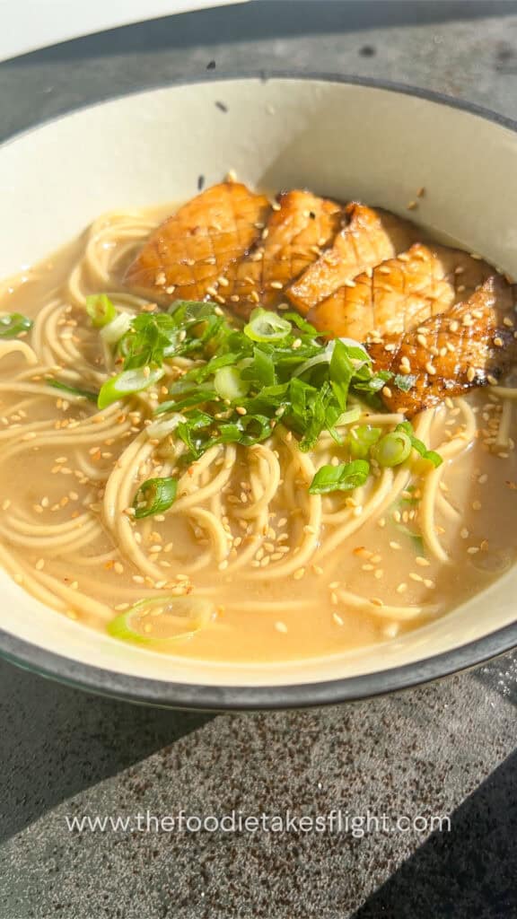 assembling roasted garlic miso noodle soup