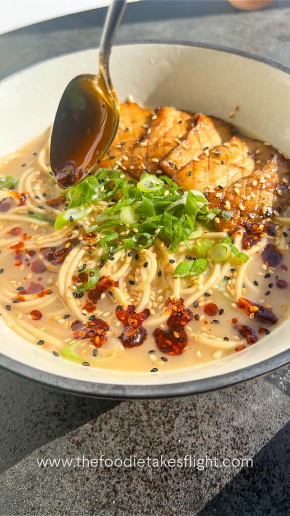 assembling roasted garlic miso noodle soup