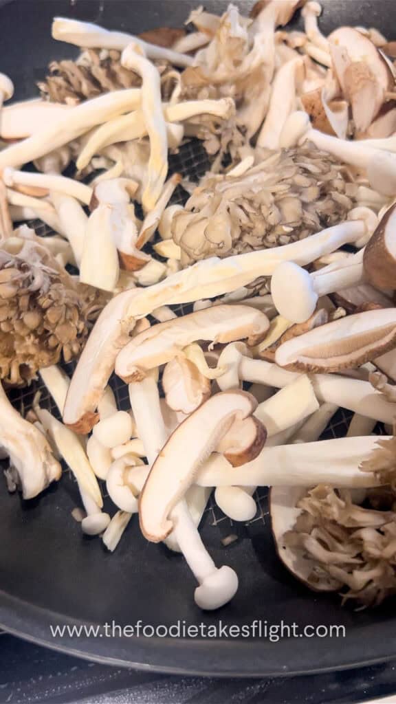 searing mushrooms on a pan