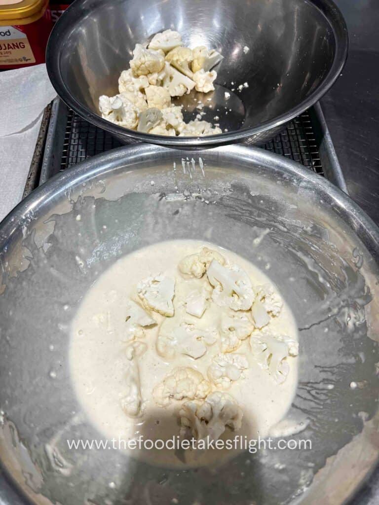 dipping cauliflower in the batter