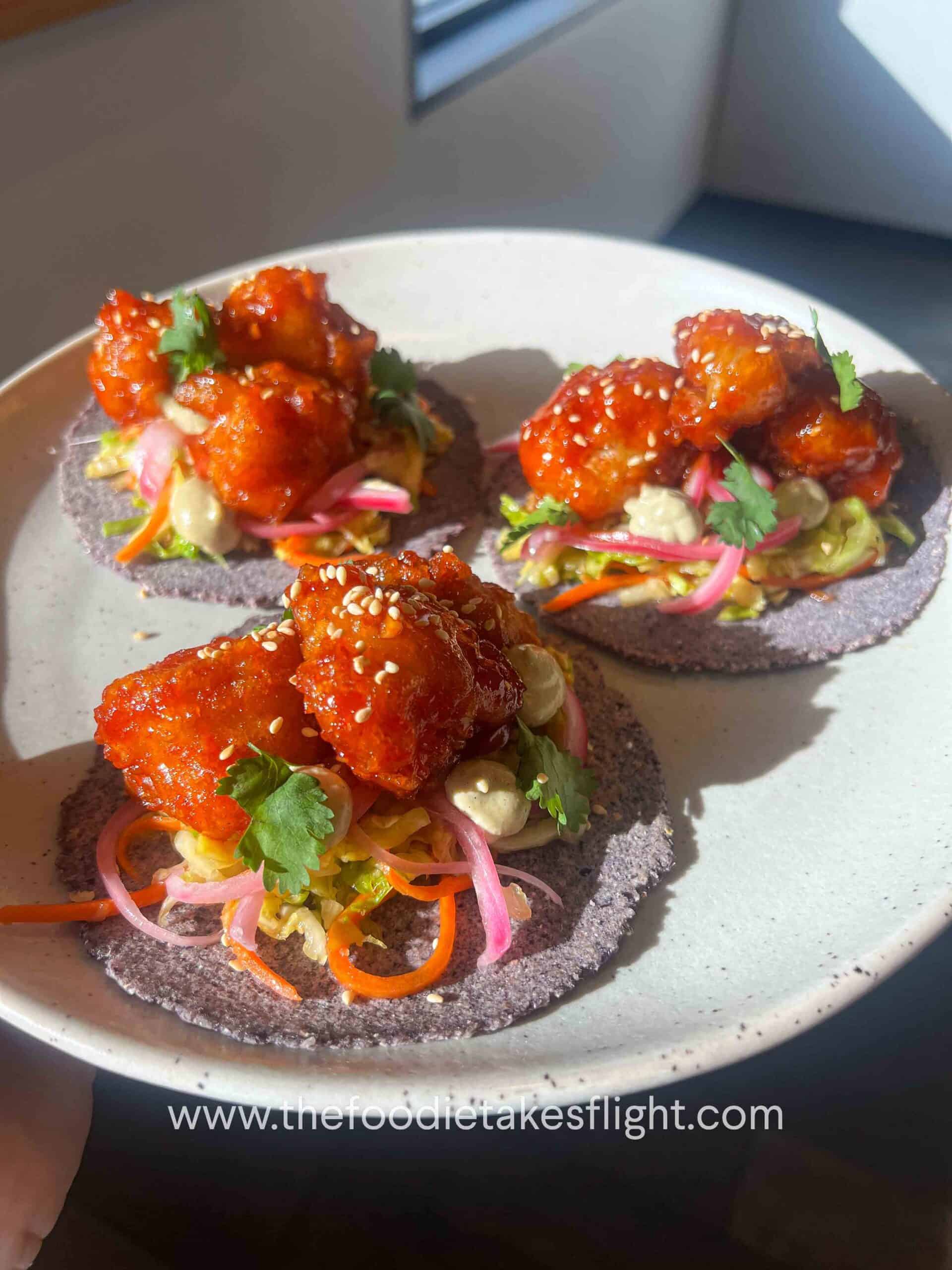 gochujang cauliflower tacos on corn tortillas