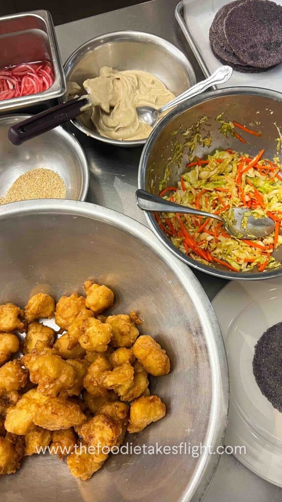 crispy fried cauliflower with cabbage slaw, cashew cream