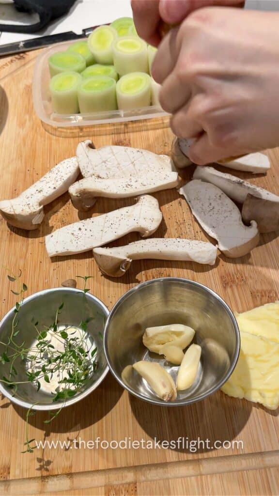 Seasoning mushrooms with salt and pepper