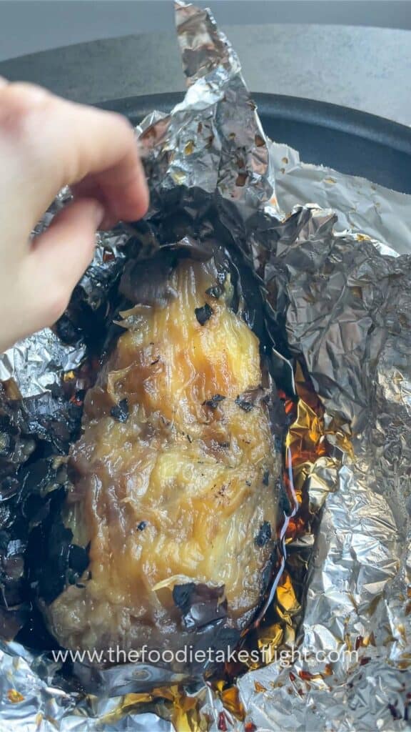 peeling roasted eggplant