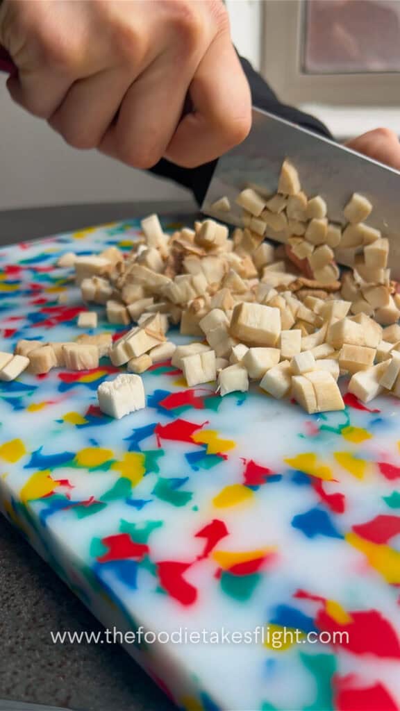 slicing king oyster mushrooms