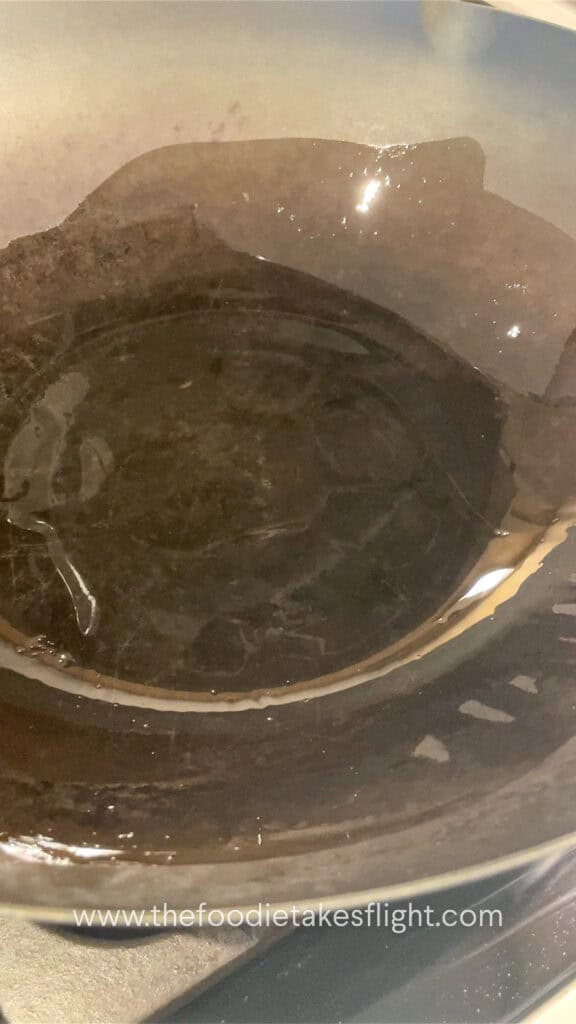 heating oil in a wok