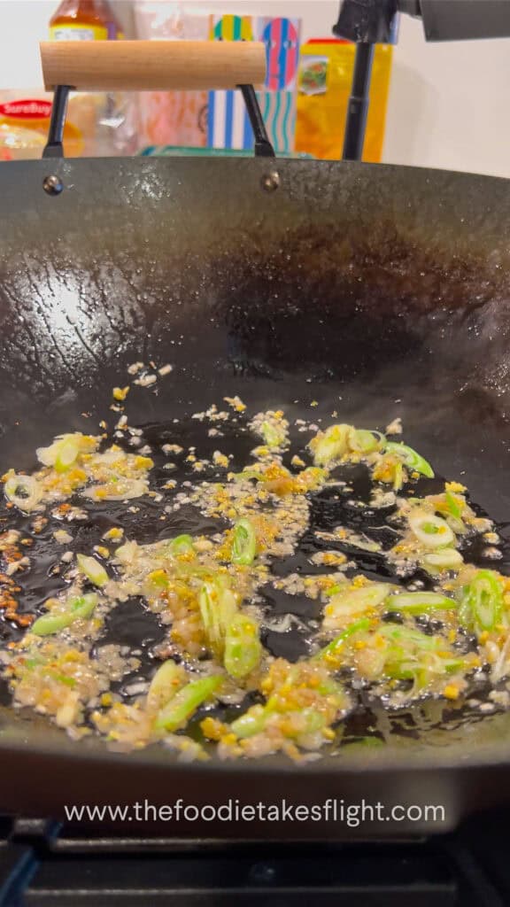 stir-frying aromatics