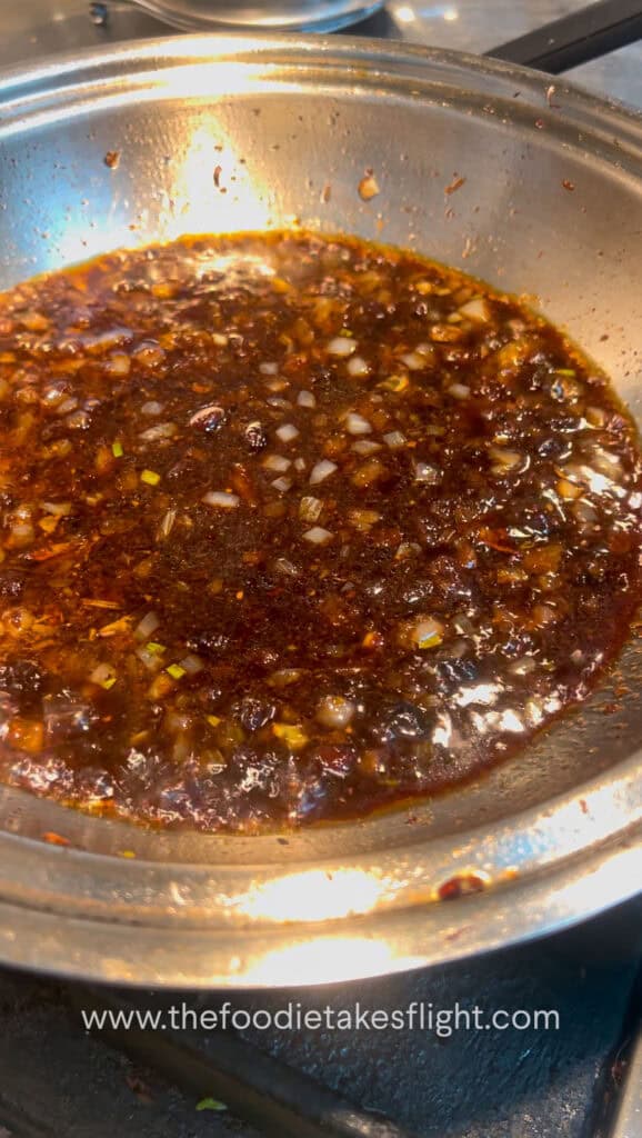 cooking minced tofu with spicy black bean sauce