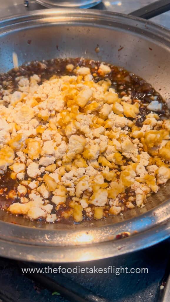 cooking minced tofu with spicy black bean sauce