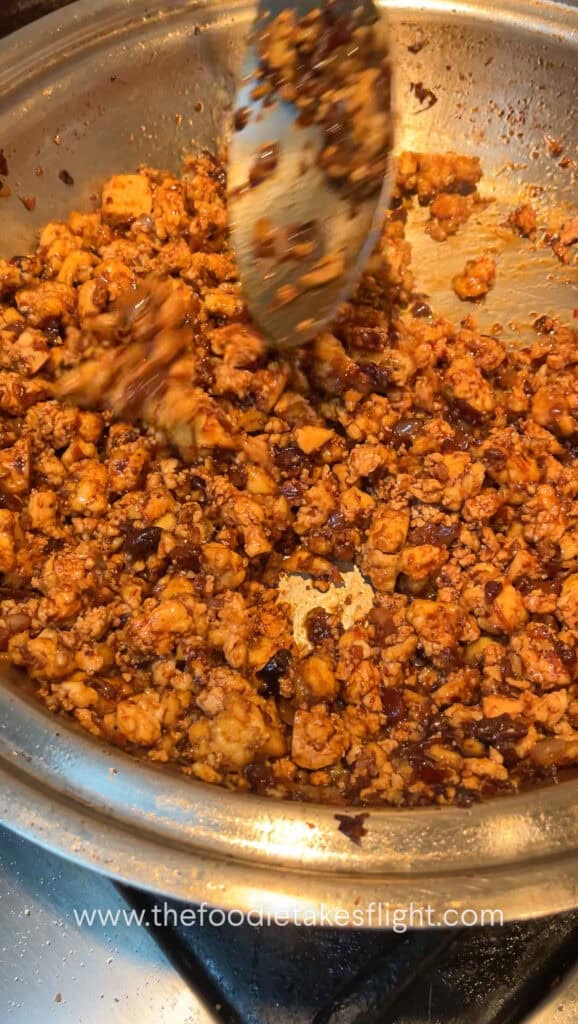 cooking minced tofu with spicy black bean sauce