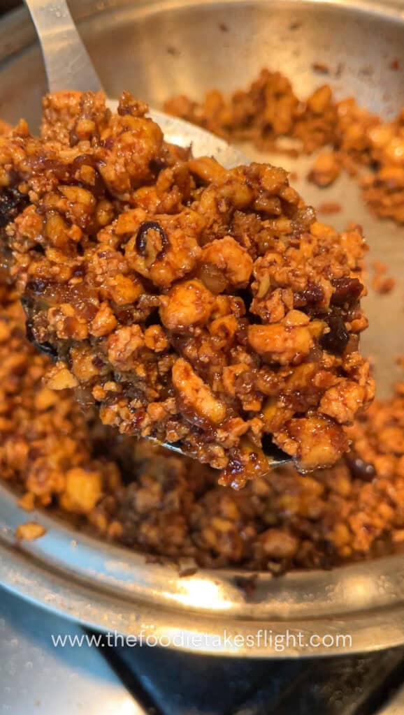 cooking minced tofu with spicy black bean sauce