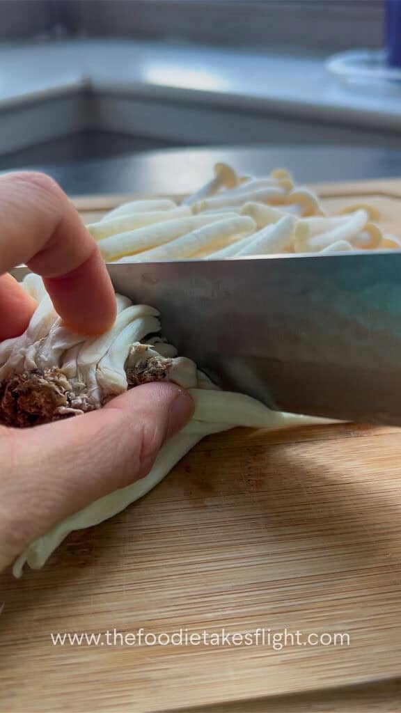 slicing seafood mushrooms
