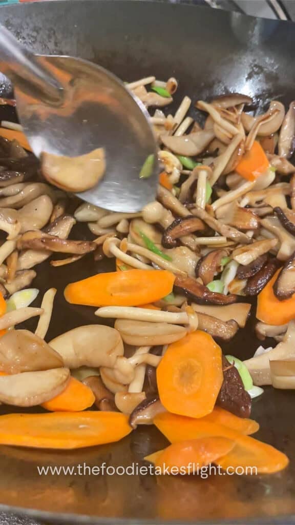 stir fried mushrooms with ginger, garlic, onions, carrots