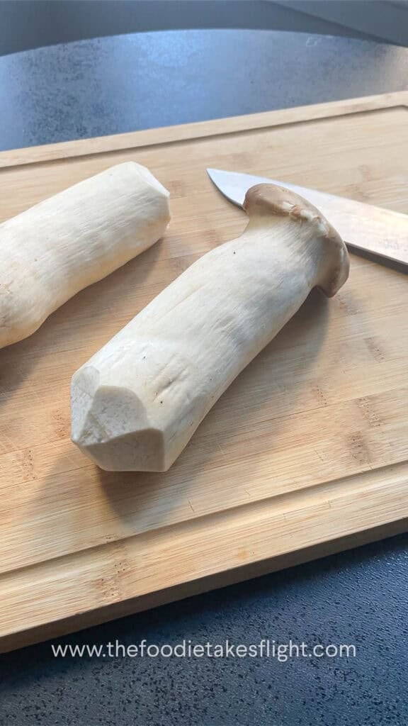 slicing king oyster mushrooms
