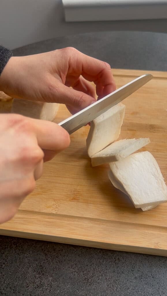 slicing king oyster mushrooms