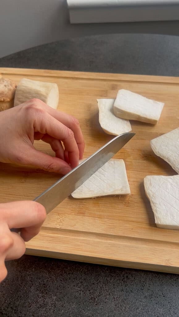 slicing king oyster mushrooms