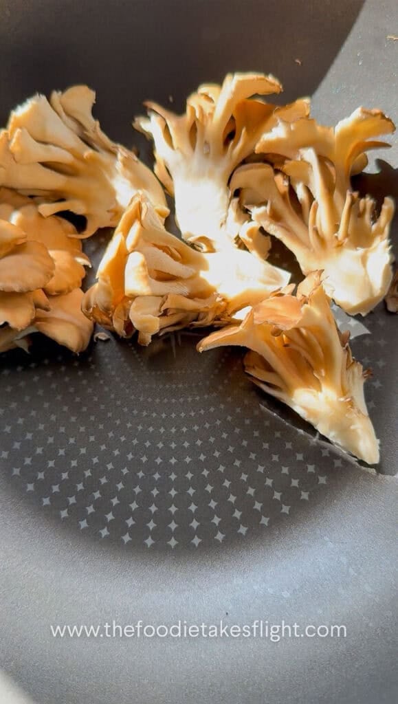 searing fresh maitake or hen of the wood mushrooms
