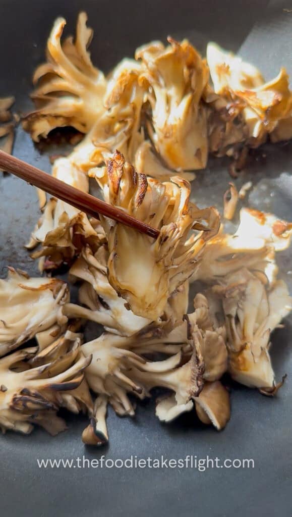 searing fresh maitake or hen of the wood mushrooms