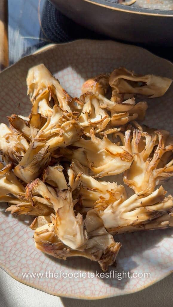 searing fresh maitake or hen of the wood mushrooms