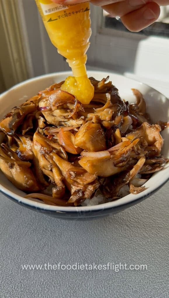 seared maitake or hen of the wood mushrooms in ginger teriyaki sauce over steamed Japanese rice