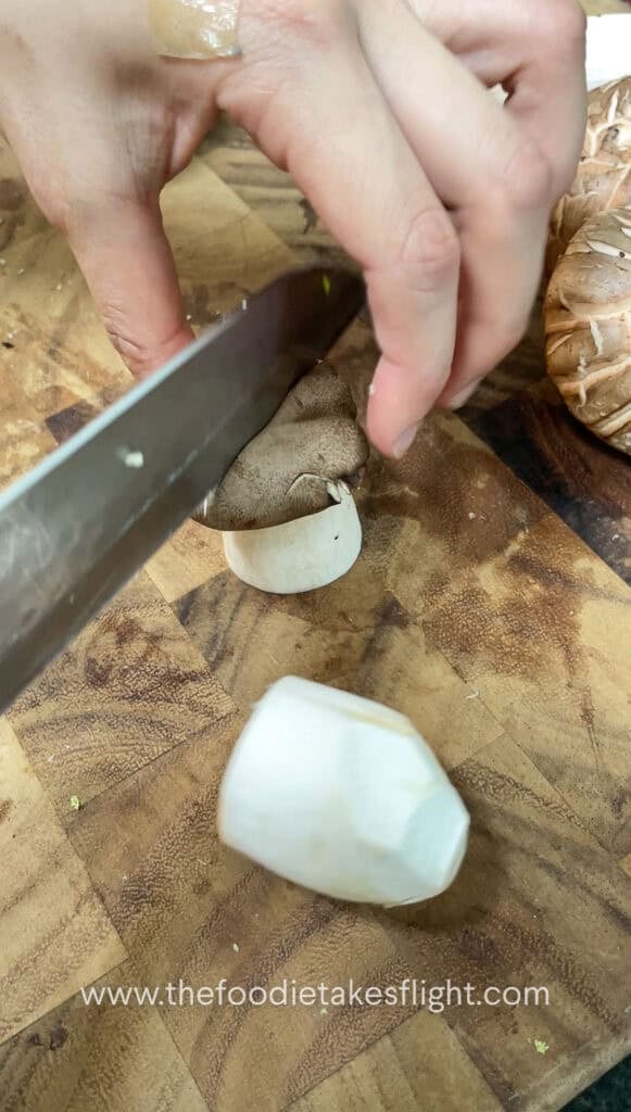 slicing king oyster mushrooms