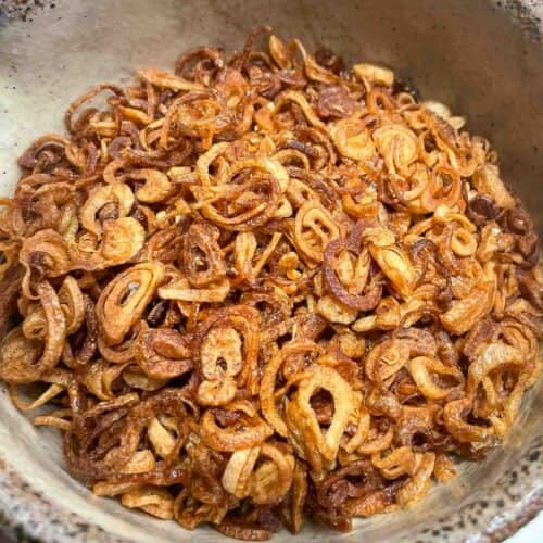 Golden brown crispy fried shallots in a bowl