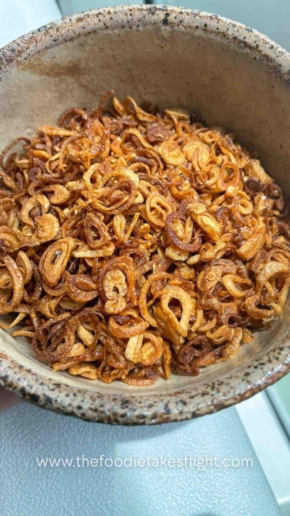 Golden brown crispy fried shallots in a bowl