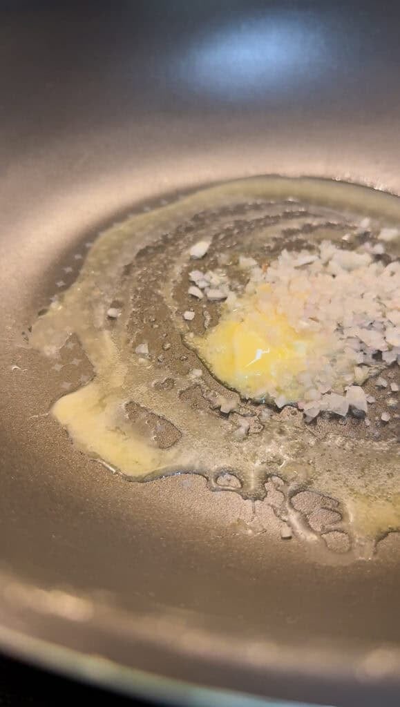 cooking down shallots in wok