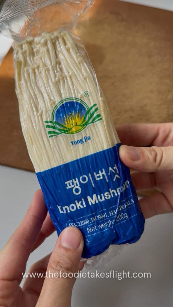 a pack of enoki mushrooms