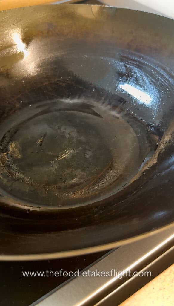 Wok heating with oil